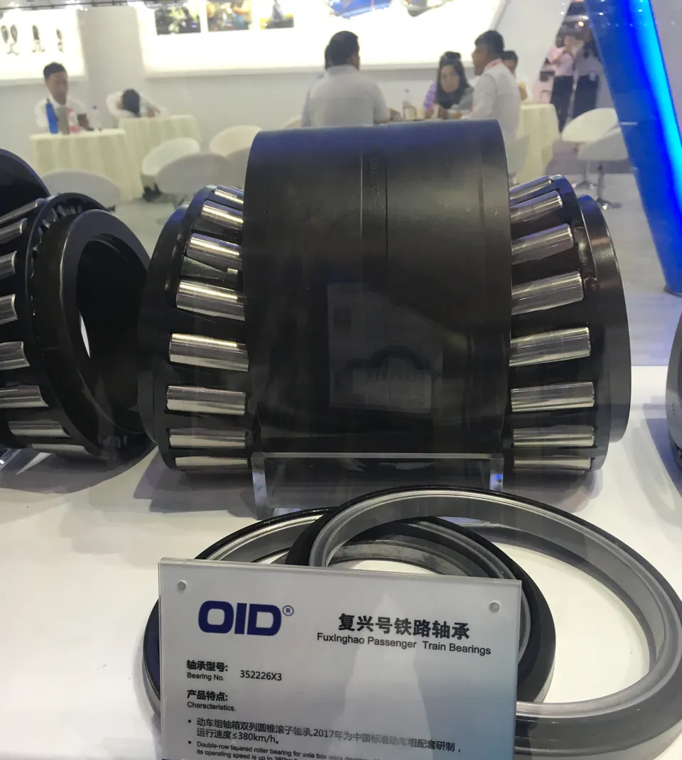 A large bearing with rollers and an OID nameplate on display
