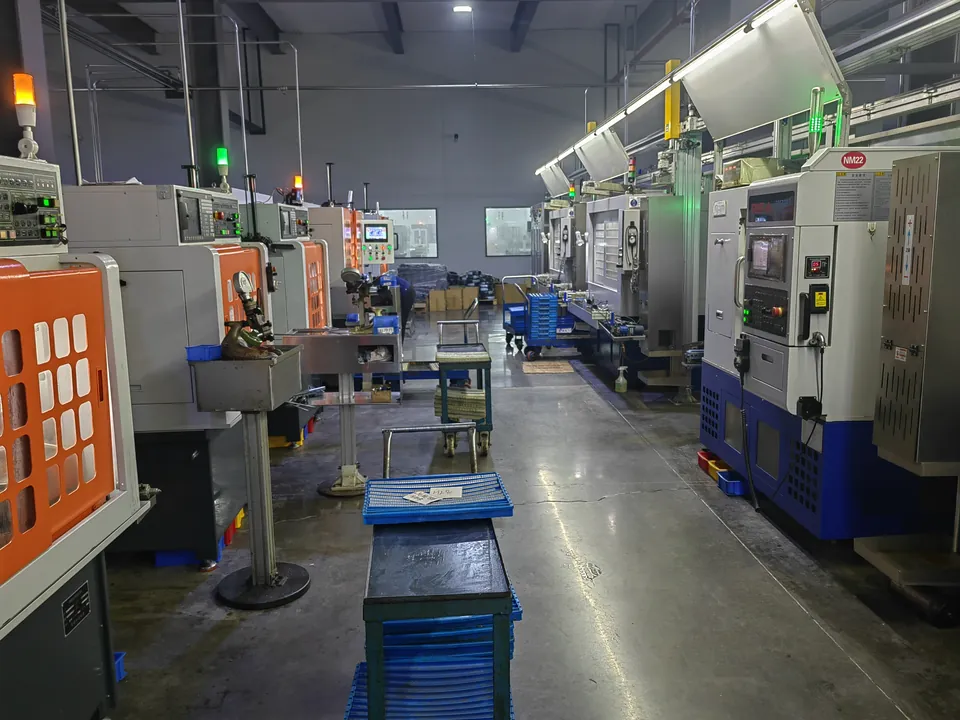 A row of machine tools along an aisle in the production shop